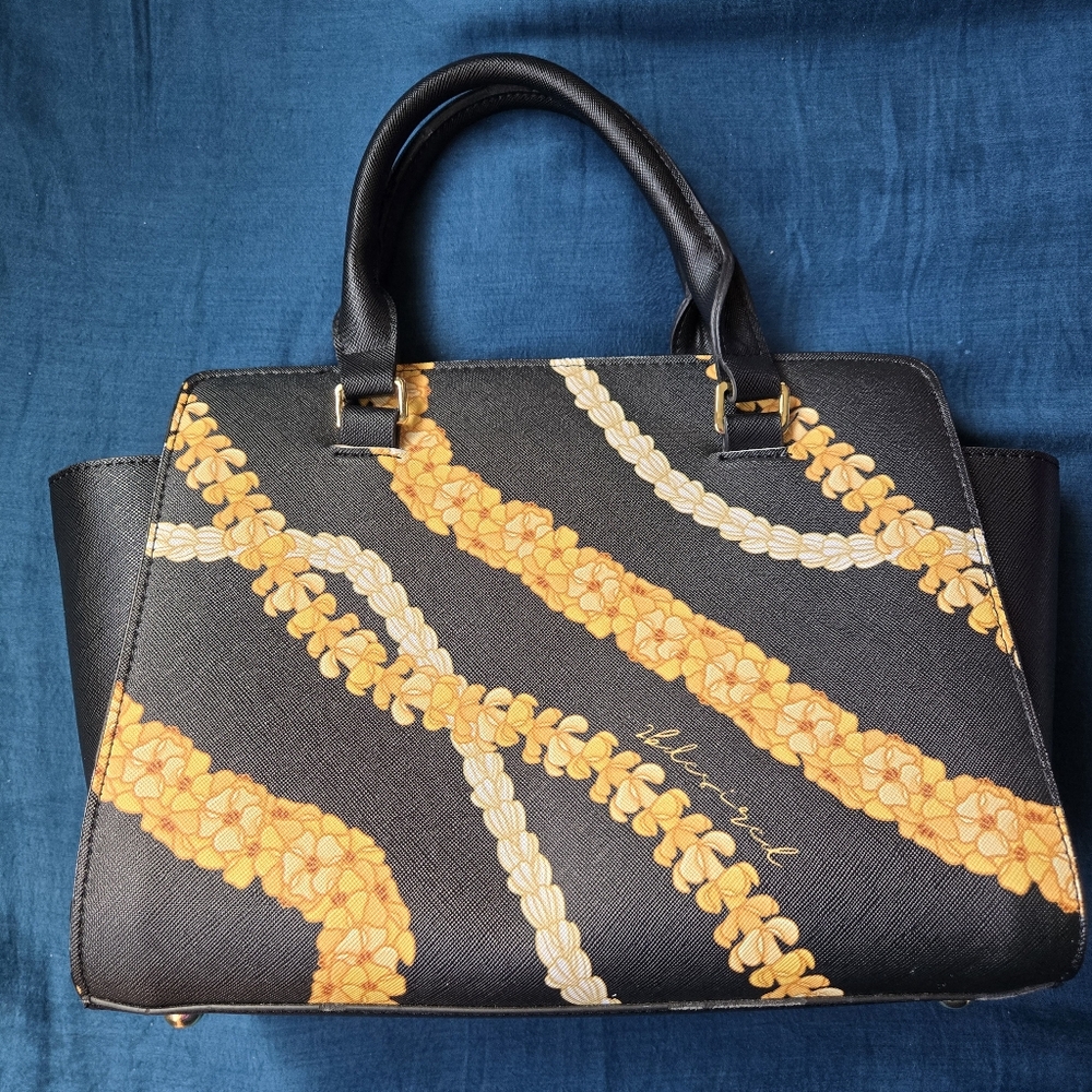 Elegant Black and Orange Tote with Textured Design